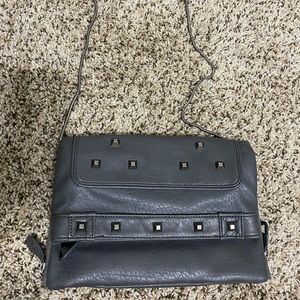 grey studded hand bag